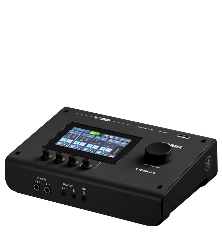 Black audio interface with display and controls on a white background